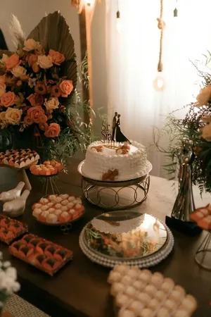 Wedding photo: dessert table wedding cake couple topper